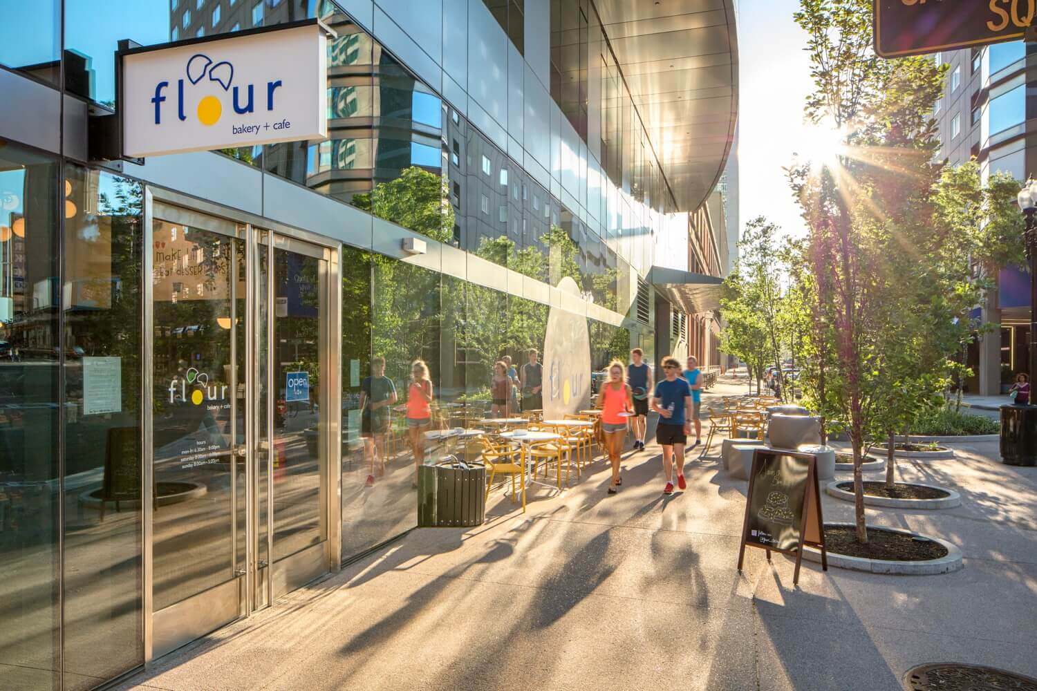 Sip a Latte while taking in the city at Flour Bakery & Cafe- Right Outside Your Doorstep slide image
