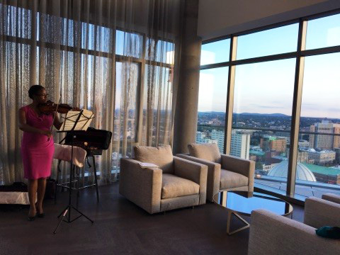 Monique Smith, a violinist from the Berklee School of Music entertained guests with classical music. 